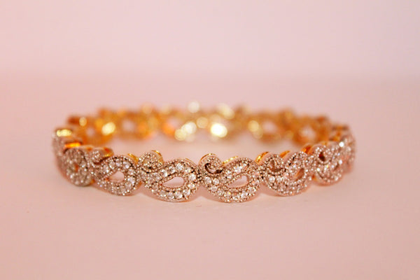 Elegant 1-gram gold jewellery set displayed on neutral background